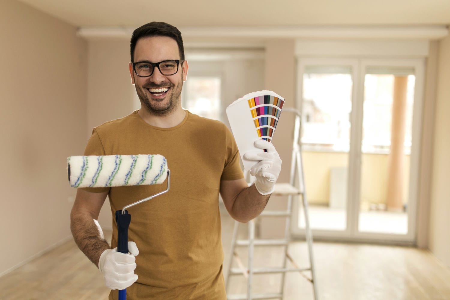 happy painter showing an option of color tones